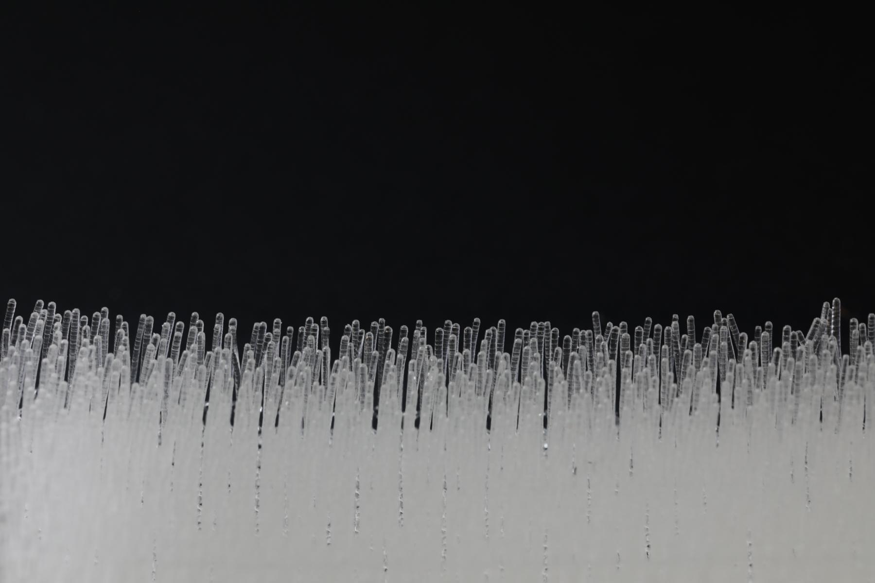 How Brush Mat Linings Improve Parts Feeding in a Vibratory Conveyor